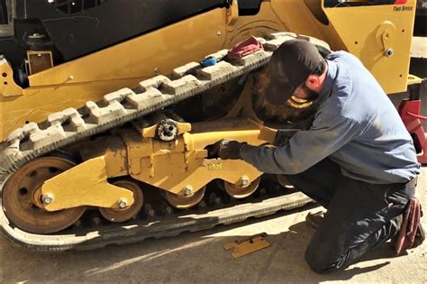 cat skid steer track adjustment|Properly Adjusting Your CTL’s Track Tension.